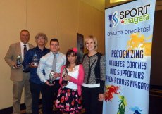 David Whitty, from left, coach of the year; Peter Scott, 132nd Royal Canadian Henley Regatta chairman, event of the year; Nick Rowe, male athlete of the year; and Julianne Miszk with Olympic gold medallist and TSN personality Tessa Bonhomme at the Niagara Sport Commission awards breakfast Thursday in Niagara Falls. BERND FRANKE/Tribune Staff